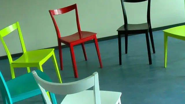Chairs arranged in a circle for an Open Space Technology session
